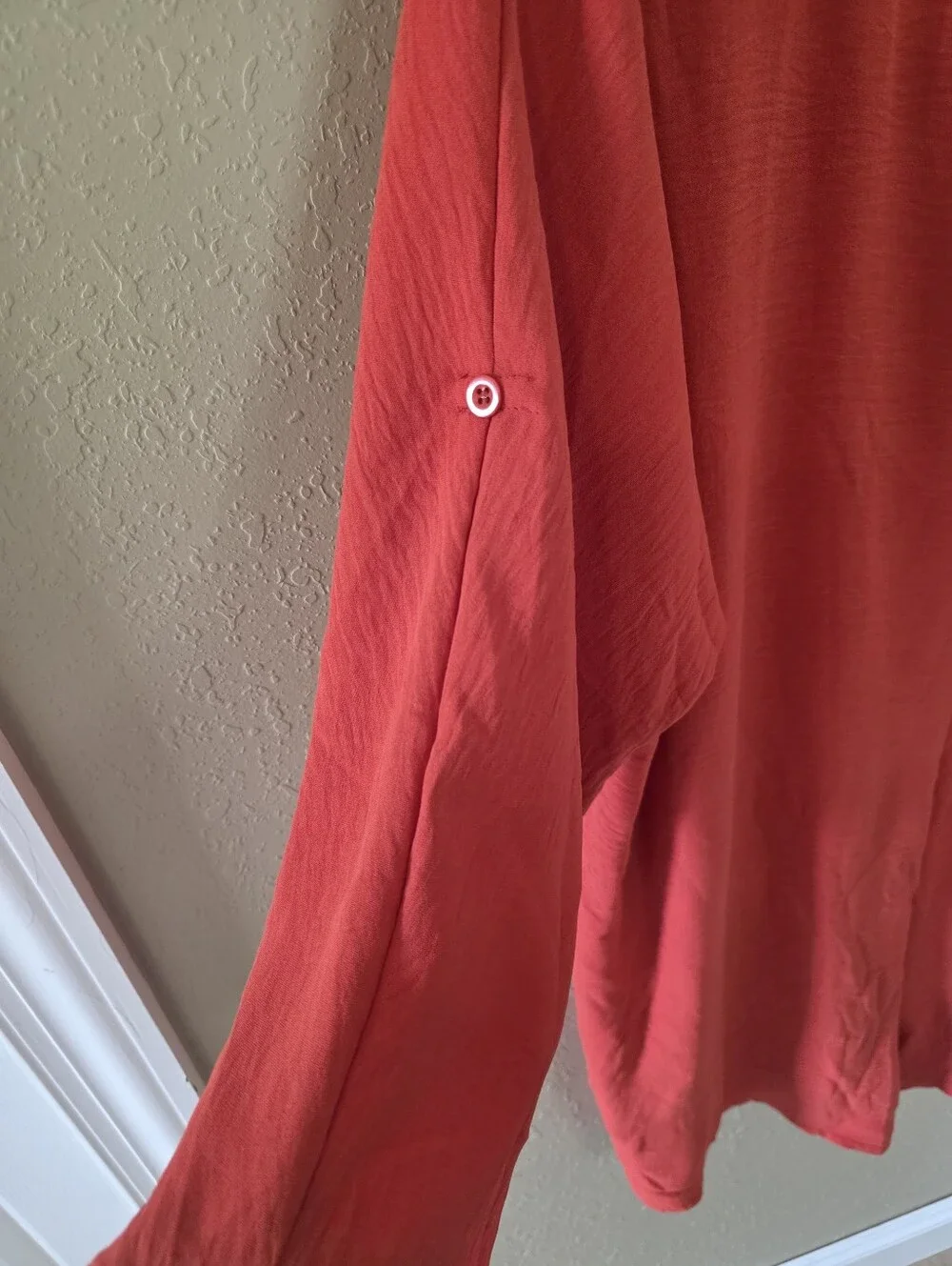 Orange Women’s Romper. V-Neck Textured. Hidden Zipper On Back.
